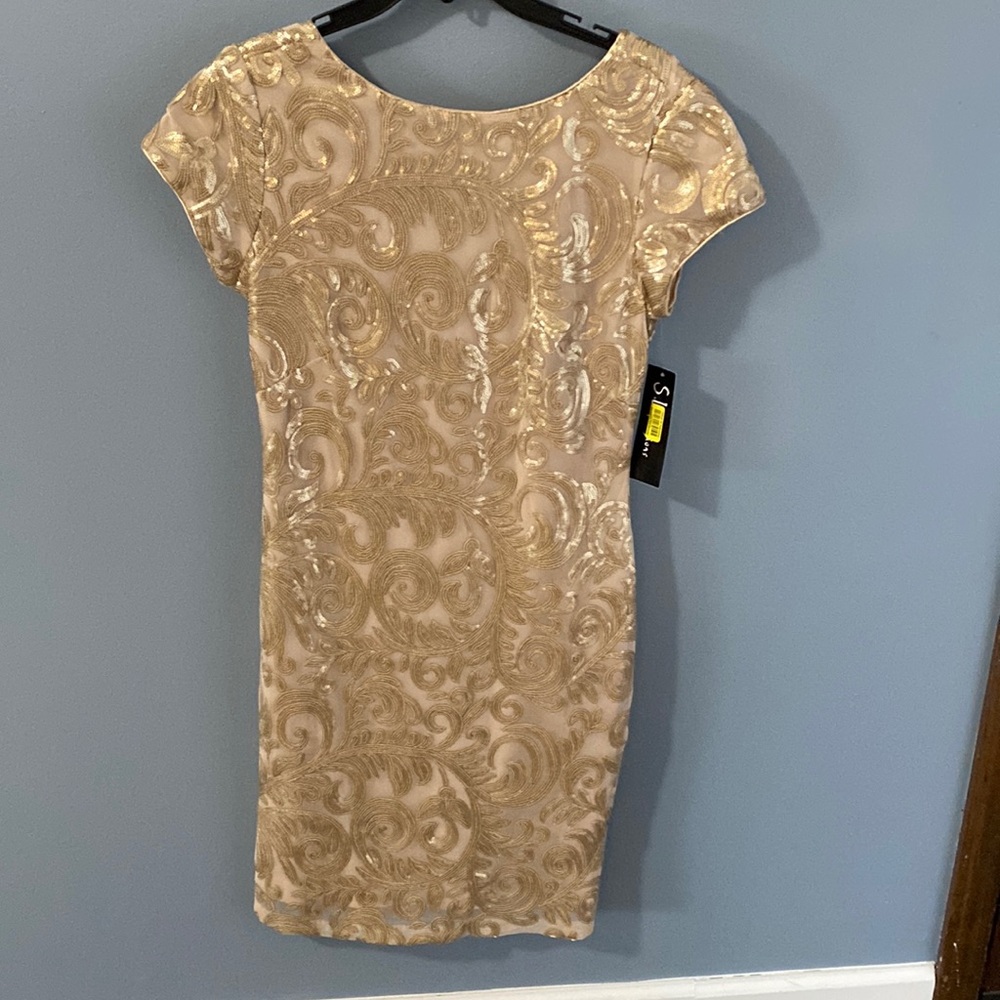 Gold sequin short dress. NWT                   Measures 38’ from top to bottom